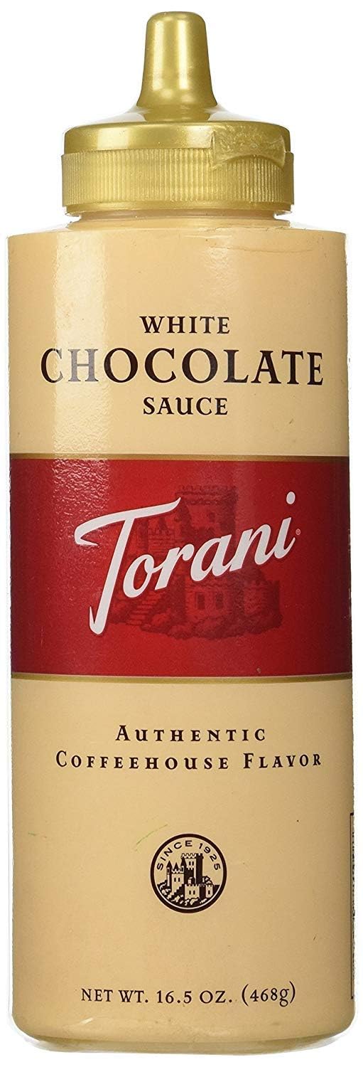 Torani White Chocolate Puremade Sauce 4-pack bottles ready for home café use.