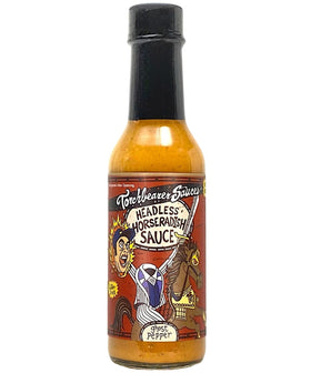 TorchBearer Headless Horseradish Ghost Pepper hot sauce bottle on counter adds bold flavor to meals.