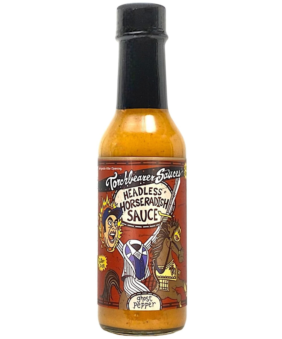 TorchBearer Headless Horseradish Ghost Pepper hot sauce bottle on counter adds bold flavor to meals.