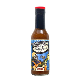 Torchbearer Mushroom Mayhem bottle pour reveals rich umami with medium heat for balanced dishes.