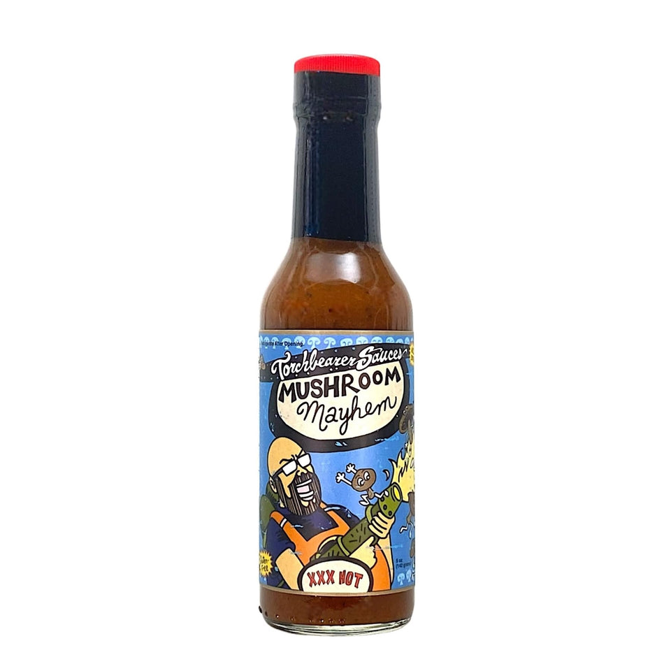 Torchbearer Mushroom Mayhem bottle pour reveals rich umami with medium heat for balanced dishes.