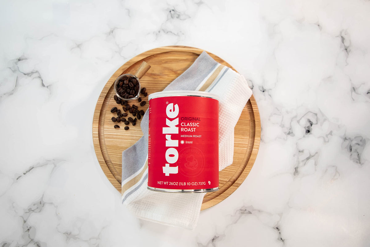 Torke Coffee ground 26 oz can on shelf highlights recyclable packaging for easy storage.