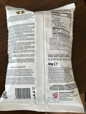 Torres Selecta Black Truffle Chips close-up; visible truffle specks enhance premium snacking.