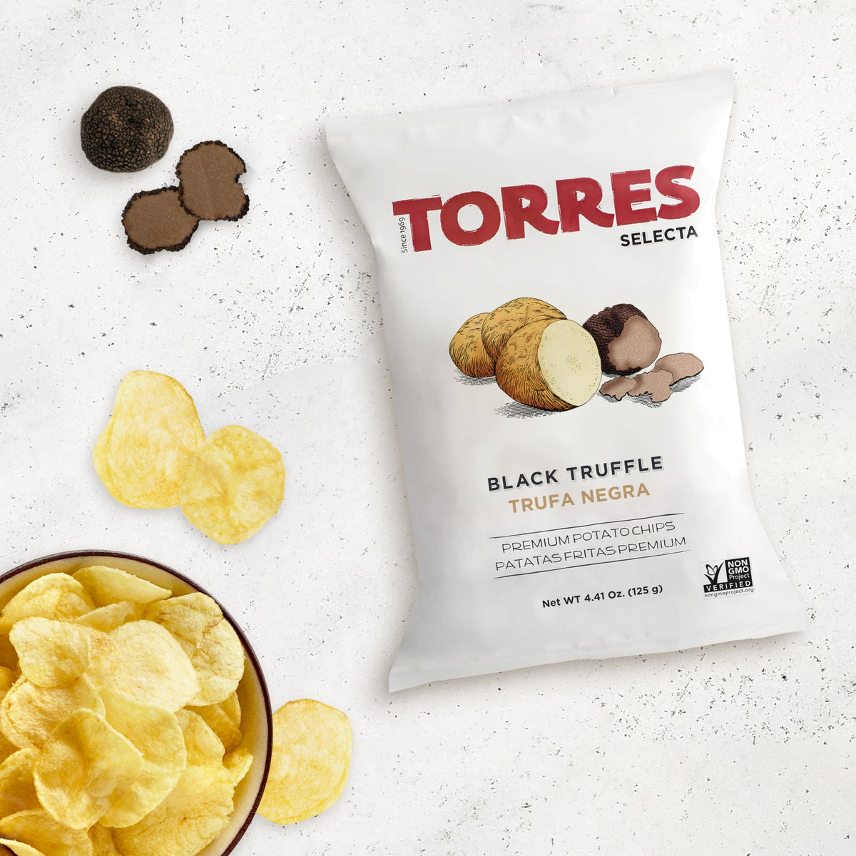 TORRES Selecta serving plate with chips for tapas nights and sharing.