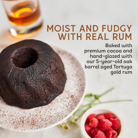TORTUGA gold rum bottle detail highlighting oak-aged quality.