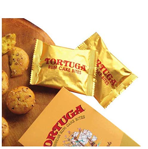 Close-up of TORTUGA rum cake bites highlighting moist texture and walnut bits.