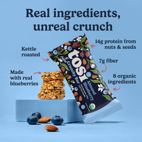 Tosi Meal Nut Bar Almond Blueberry close-up shows crunchy texture and real fruit bits
