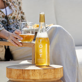 TOST label-front close-up, premium alcohol-free beverage with balanced flavor.