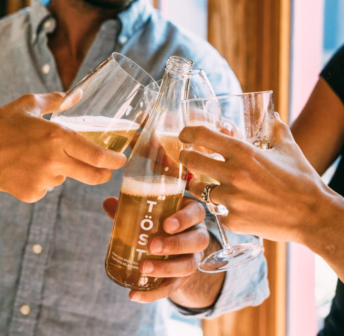 TOST lifestyle picnic scene suggests versatile pairing with light bites