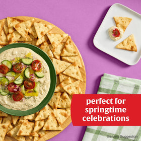 Town House Sea Salt Pita Crackers served with hummus for a satisfying snack.