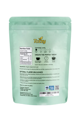 Tozzy Organic Spearmint Tea display emphasizes sustainable sourcing and quality.