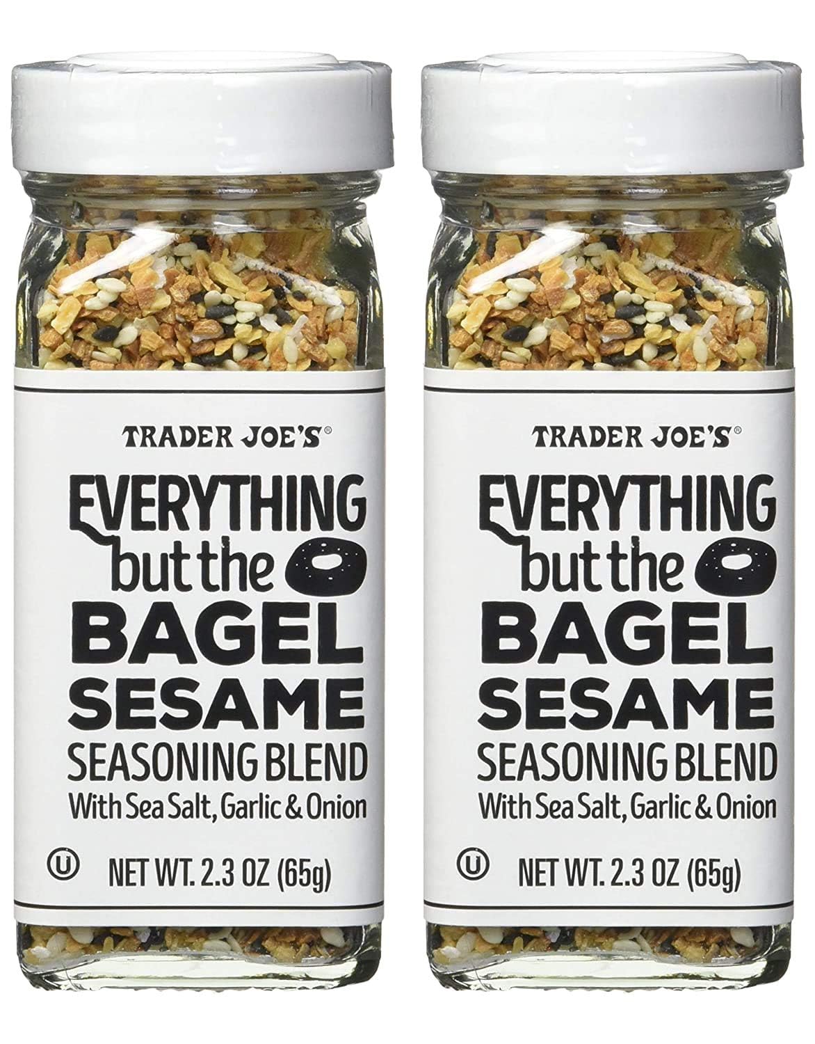 Trader Joe's Everything but the Bagel Sesame Seasoning bottle close-up with sesame seeds.