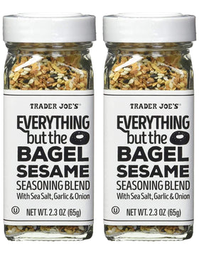 Trader Joe's Everything but the Bagel Sesame Seasoning bottle close-up with sesame seeds.