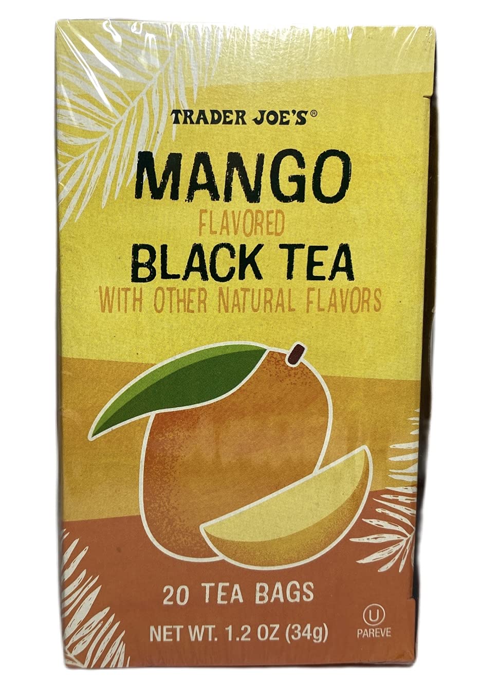 Cup of Trader Joe's Mango Black Tea with pastry, morning ritual.