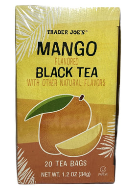 Cup of Trader Joe's Mango Black Tea with pastry, morning ritual.