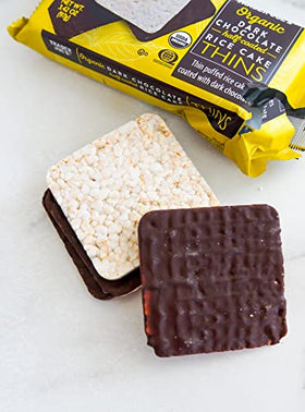 Trader Joe's Organic Dark Chocolate Puffed Rice Cake Thins close-up of chocolate coating; rich flavor and crisp crunch.