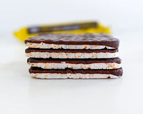 Trader Joe's Organic Dark Chocolate Puffed Rice Cake Thins label shows organic and gluten-free attributes.