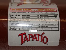 Trader Joe's Tapatio hot sauce two bottles pouring over a dish to boost flavor