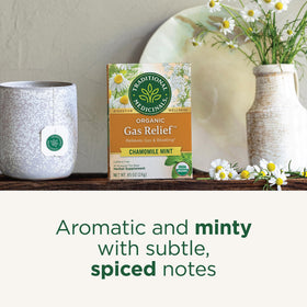 Traditional Medicinals Gas Relief Digestive Tea steeping mug showcasing comforting aroma and minty, soothing taste.