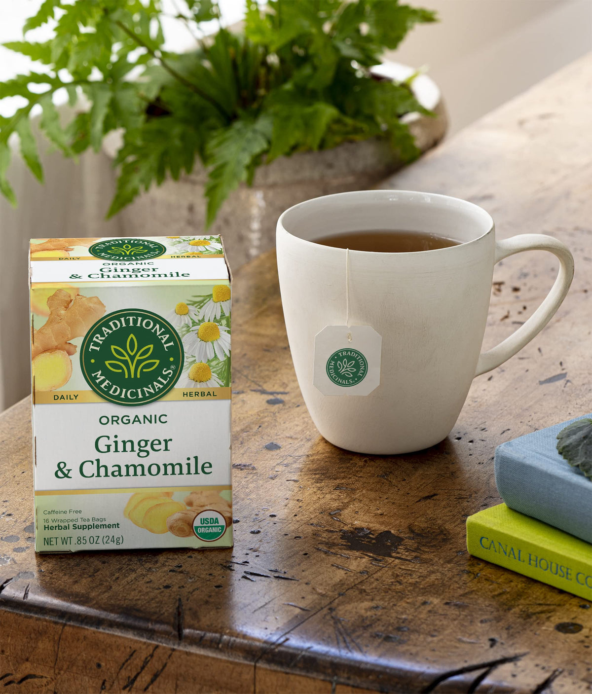 Traditional Medicinals Ginger & Chamomile tea set for evening relaxation and gentle relief potential.