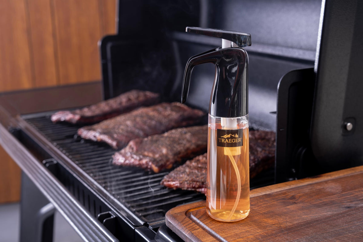 Traeger BBQ Spritzer mounted on P.A.L rail for easy access.
