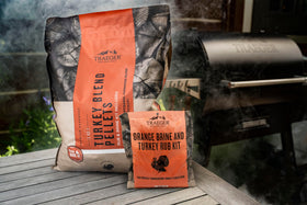 Traeger Brine Rub Kit applied to turkey and chicken for enhanced flavor and moisture.