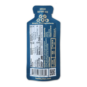 Trail Butter Lil' Squeeze peanut-chunk close-up showing roasted texture.