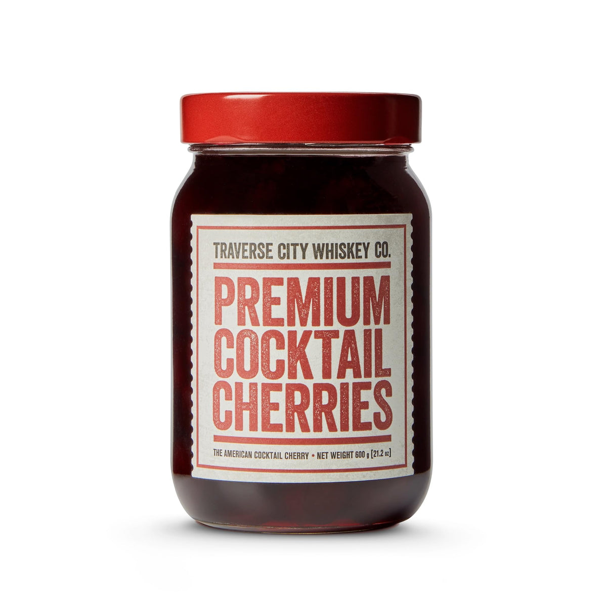 Traverse City Whiskey Co premium cocktail cherries in a jar, ideal garnish for cocktails.