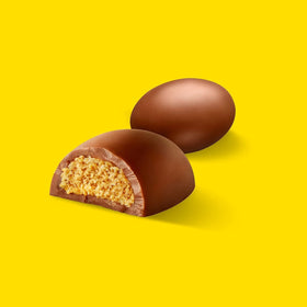 TreatBasket Resse's milk chocolate half-egg, individually wrapped for easy gifting or candy bowls.