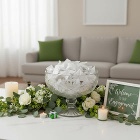 Tree Treasures mint displays in apothecary jars at an event