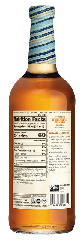 Pouring Tres Agaves organic agave nectar for smooth, natural sweetness in drinks.