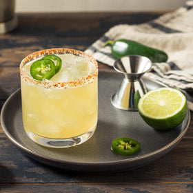 Family table with Tres Agaves cocktails featuring jalapeño heat