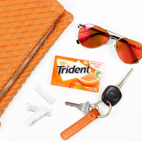 After meal chew with Trident Tropical Twist may stimulate saliva for cleanliness.