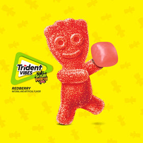 Trident Vibes Sour Patch Kids Redberry crunchy-shell closeup with textured candy surface.