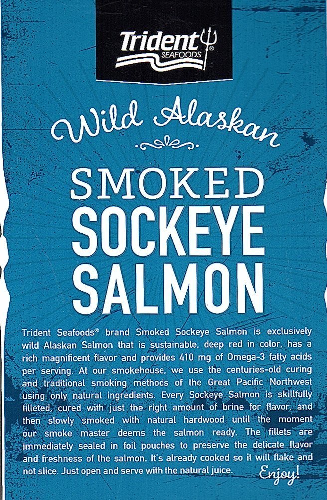 Trident Wild Alaskan Smoked Sockeye Salmon served on crackers, ideal for quick snacks.