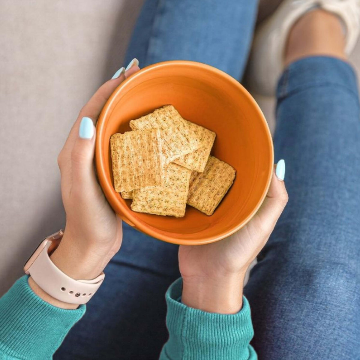 Triscuit crackers with toppings and dips, perfect for parties.