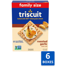 Triscuit Roasted Garlic crackers close-up highlight crisp texture.