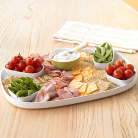 Warm kitchen scene featuring Triscuit Smoked Gouda crackers