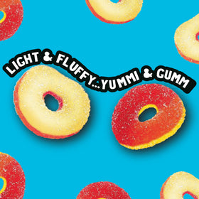 Close-up of Trolli Peachie O's sour gummy rings with tangy sugar.