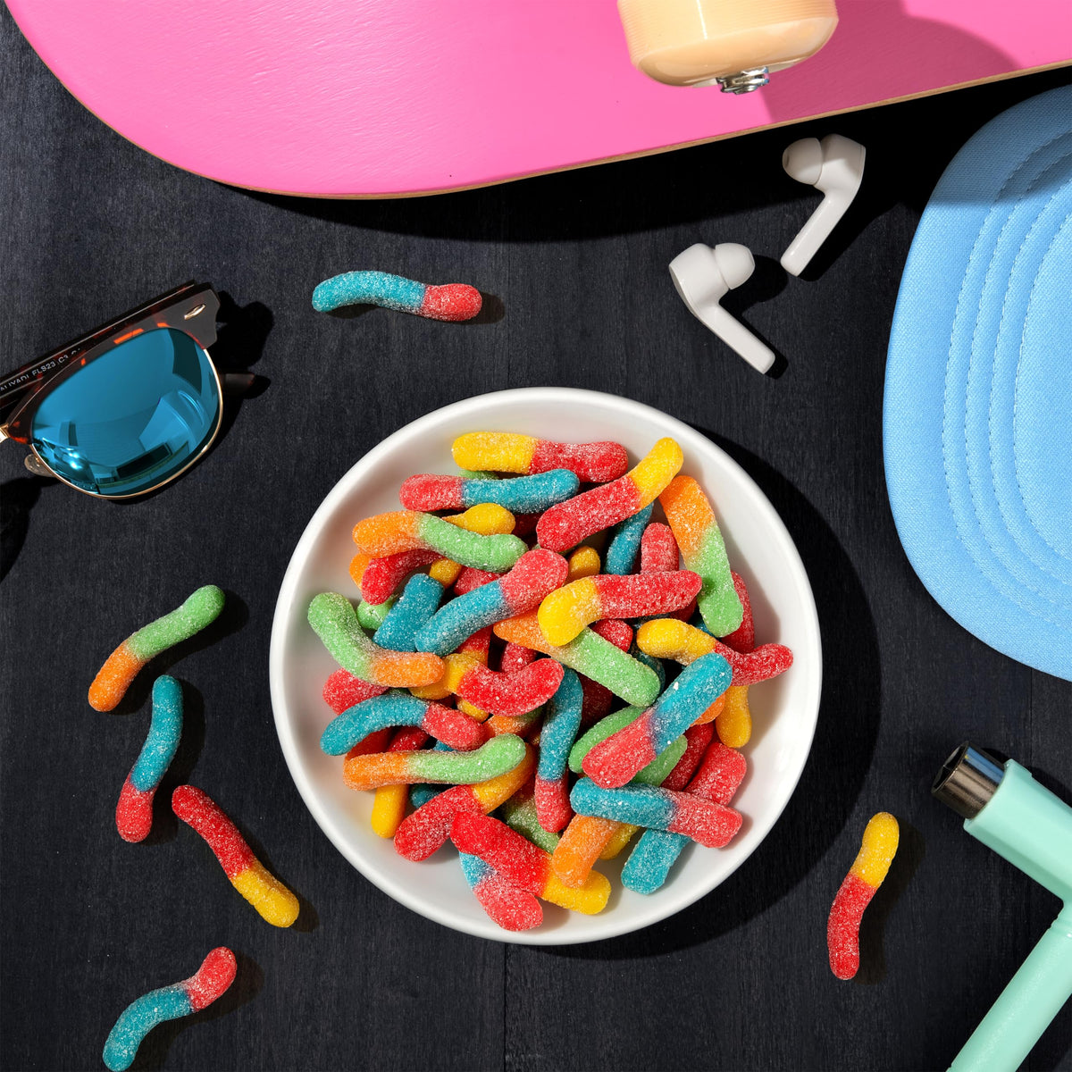 Sharing Trolli Sour Brite Crawlers in a party candy bowl setup.
