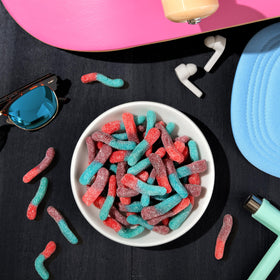 Close-up of Trolli worms with vivid colors, a chewy berry treat