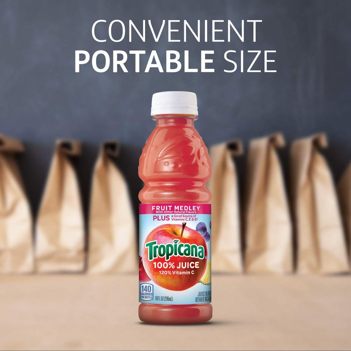 Tropicana juice bottles lined up, family-friendly pack ideal for home or on-the-go hydration.