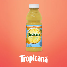 Tropicana Pineapple Orange juice chilled bottle on a desk for a refreshing break.