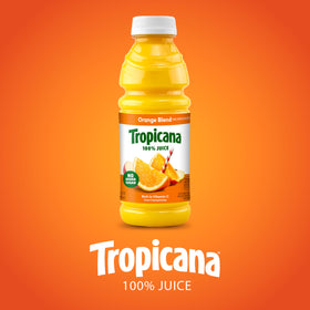 Table with Tropicana bottles and citrus slices, suggesting versatile drink ideas.