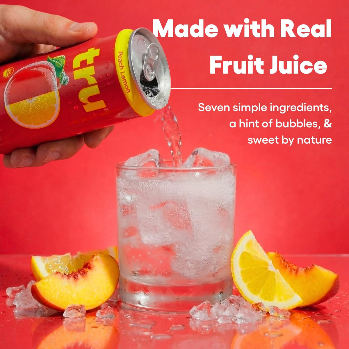Tru Organic Energy peach lemon bubbles in a glass illustrating light carbonation