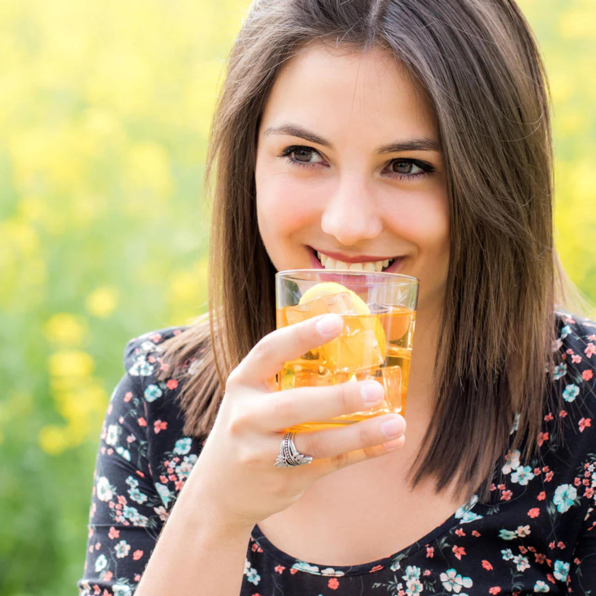 Ready-to-sip True Citrus Lemon Iced Tea Mix in a cup for at home or work