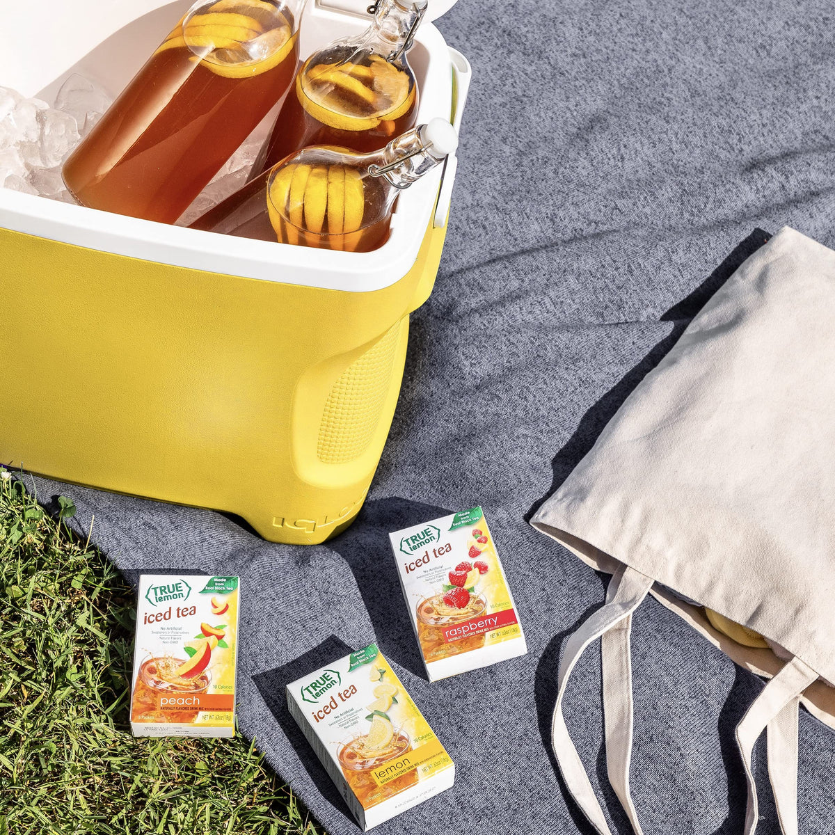 True Lemon Iced Tea bottle splash shows vibrant lemon flavor appeal