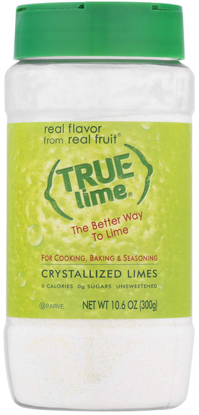 Pouring True Citrus True Lime shaker into water for a refreshing drink