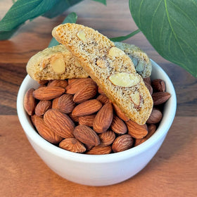 True Delicious biscotti beside a cup of coffee, perfect snack pairing