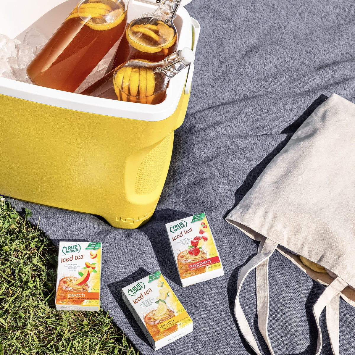 True Lemon Peach Iced Tea carton stacked on shelf communicates value
